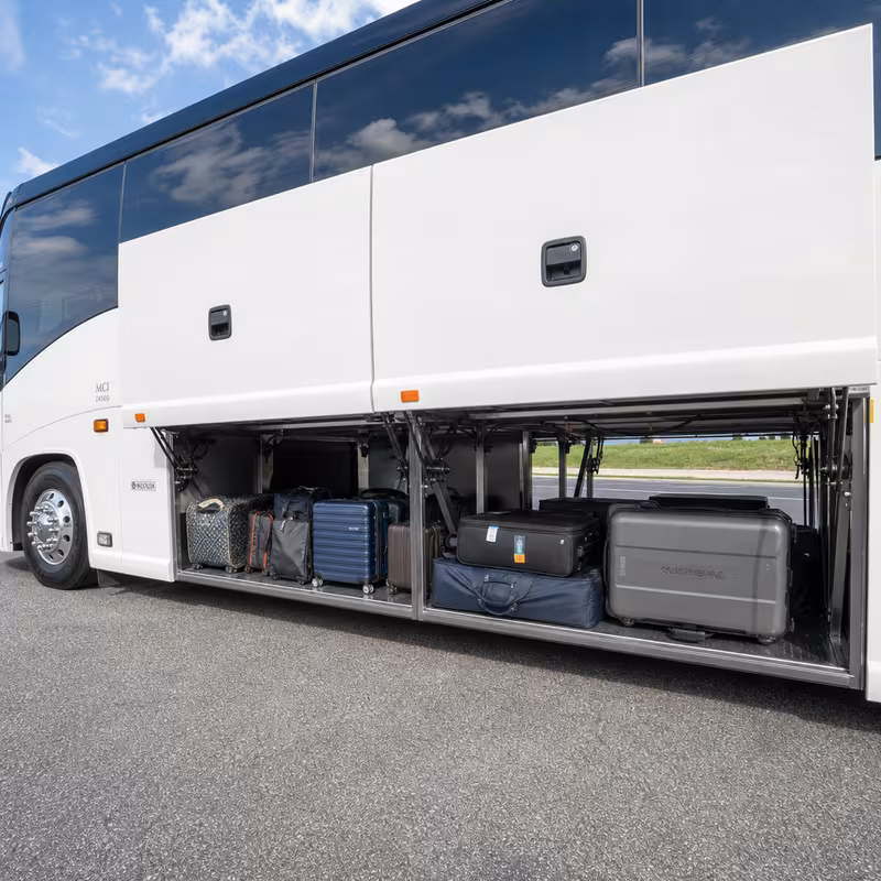 Party bus interior with wraparound leather seating and LED lighting in Arlington