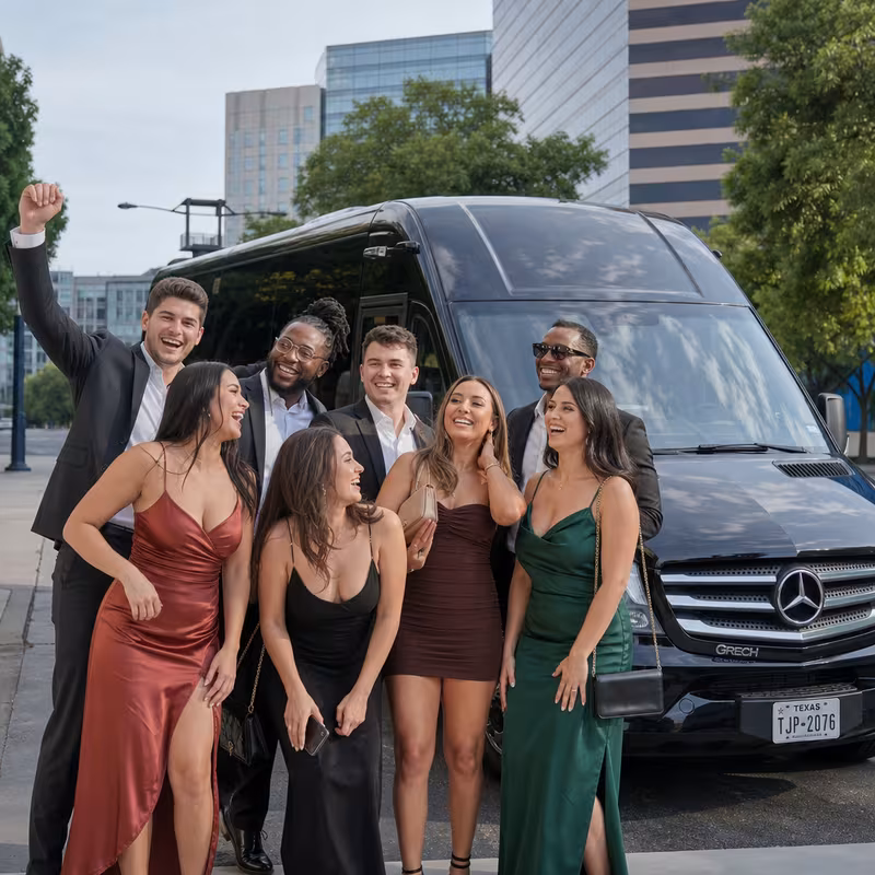 Group boarding a white charter bus for Bachelor & Bachelorette Transportation transportation in Arlington