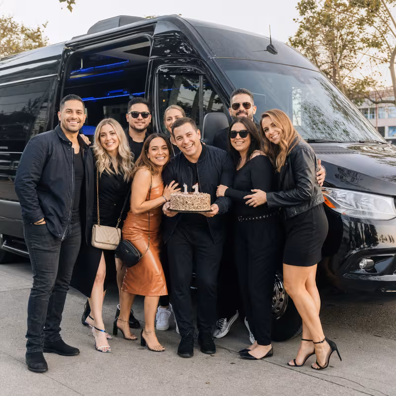 Party bus interior with wraparound leather seating and LED lighting in Arlington