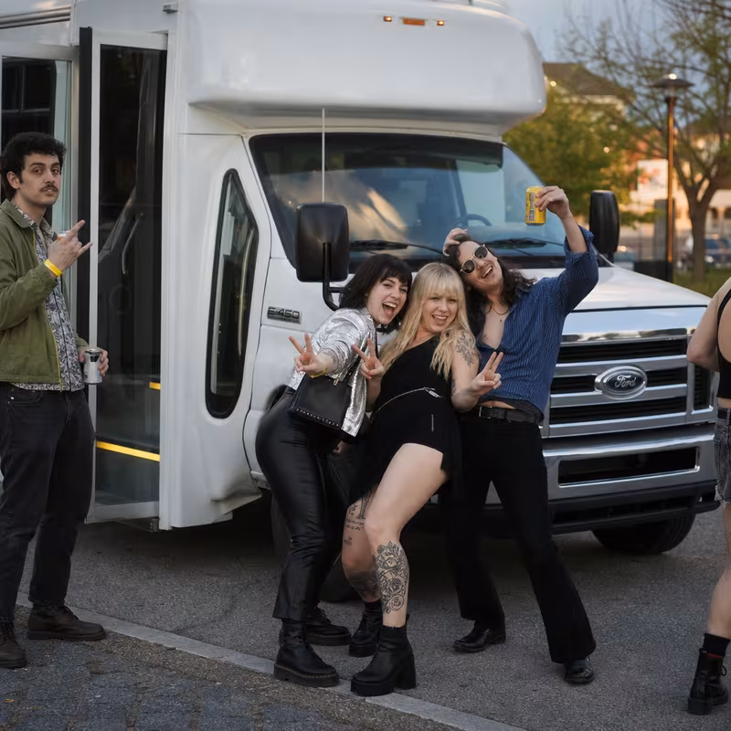 Black Mercedes Sprinter van staged for an Arlington Concert Transportation group