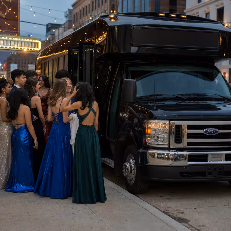 Passengers loading luggage while boarding an Arlington group shuttle