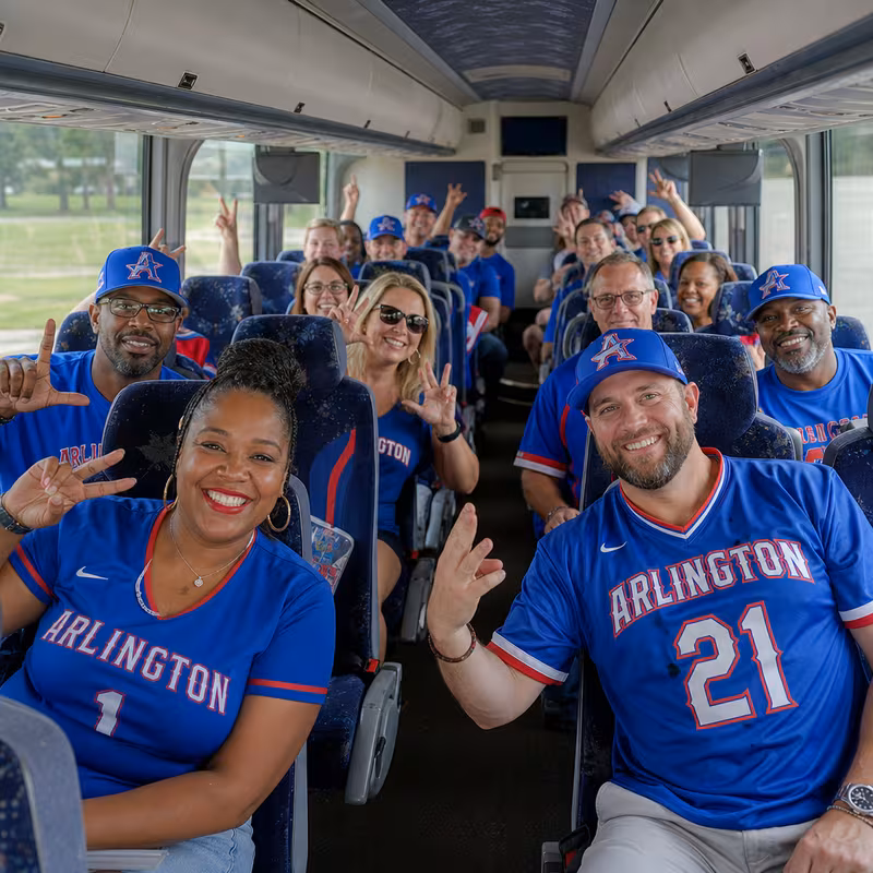 Black Mercedes Sprinter van staged for an Arlington Sporting Event Transportation group