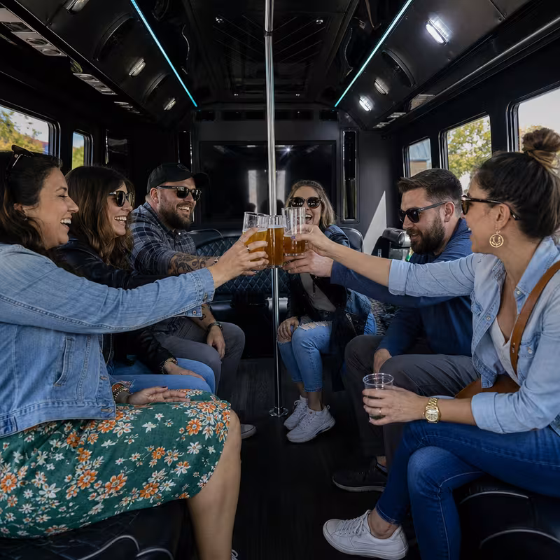 Black Mercedes Sprinter van staged for an Arlington Winery & Brewery Tour Transportation group